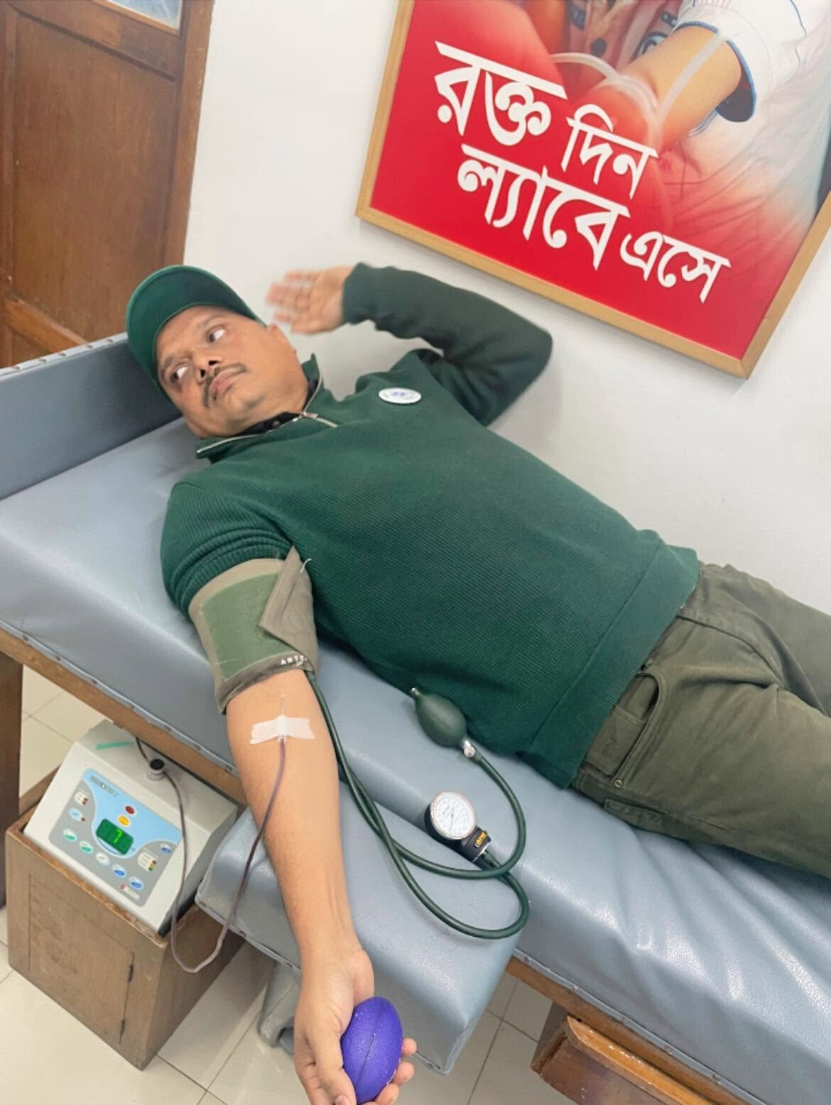 Nazrul Hosen donating blood at a donation centre