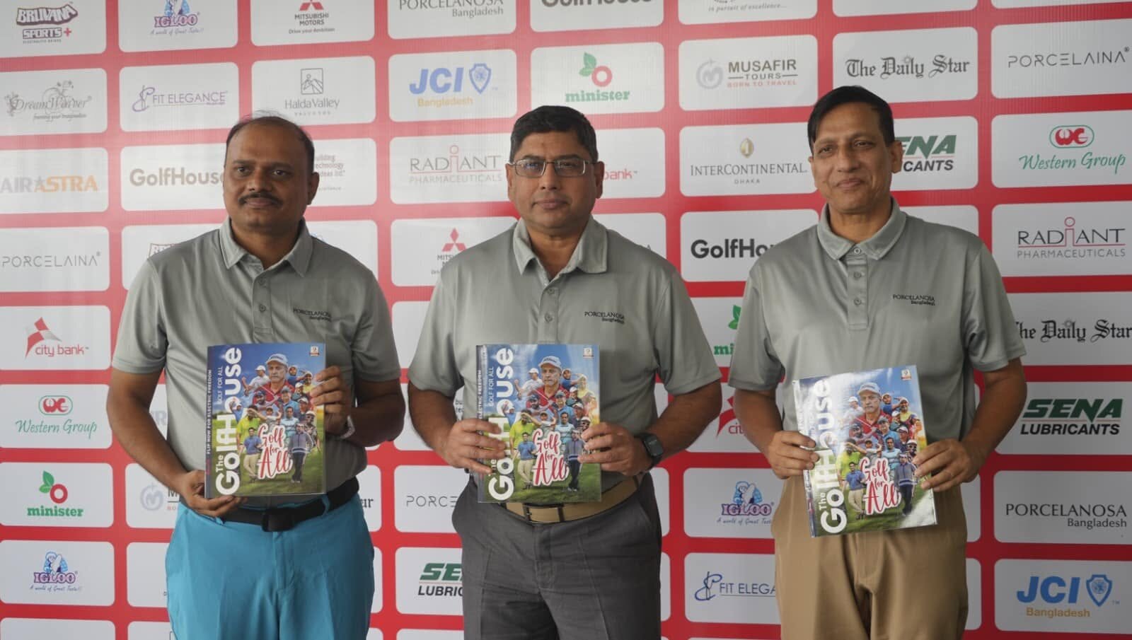 Nazrul Hosen presenting TheGolfHouse magazine with colleagues